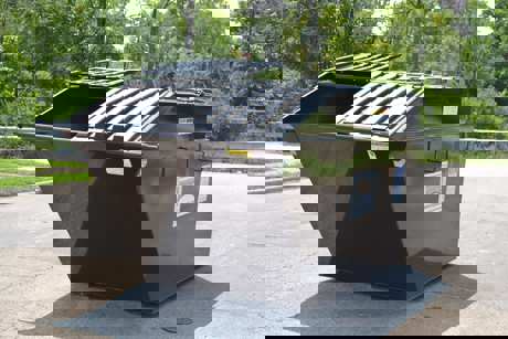 Rumpke 8 Yard Brown Rear Load Dumpster