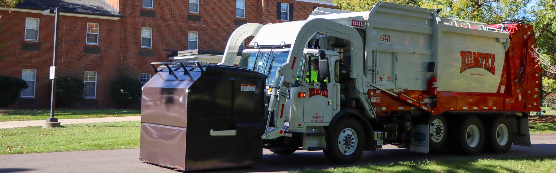 Rumpke Truck And Dumpster For Commercial Trash Pickup Services